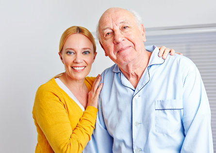 smiling caregiver with her patient